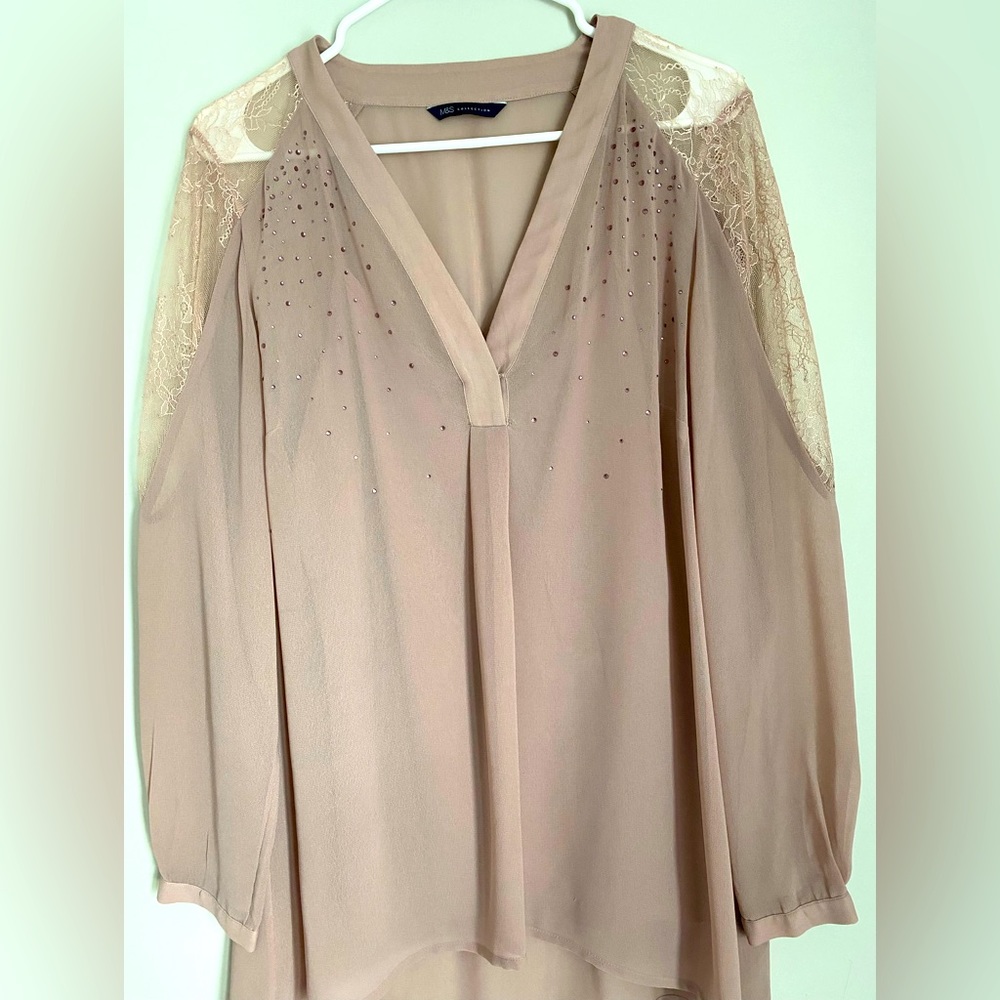 Dressy women’s blouse with attached camisole